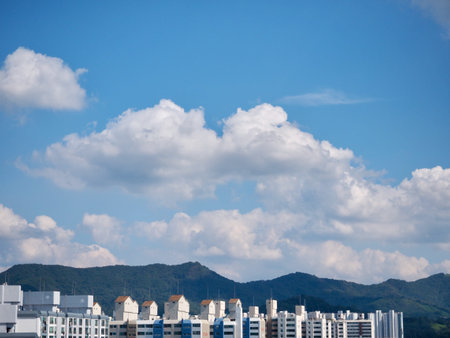 Blue sky, clouds and apartment