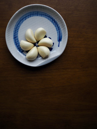 Organic Vegetable Garlic in a Porcelain Plate
