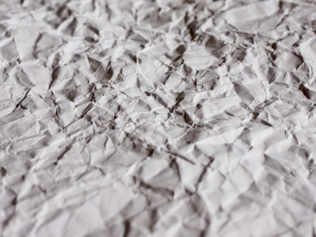 Crumpled white paper background, textureの写真素材