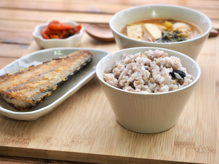 Asian food grilled fish, rice, miso soupの写真素材