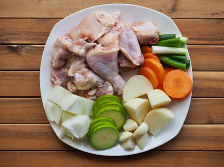 Raw chicken and vegetables, potatoes, carrots, onions, Korean food chicken stir-fry ingredientsの写真素材