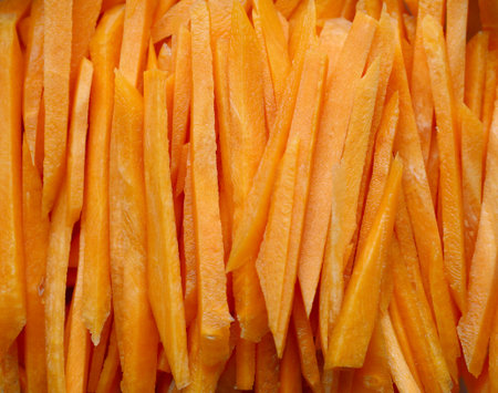 finely chopped fresh vegetable carrots backgroundの写真素材