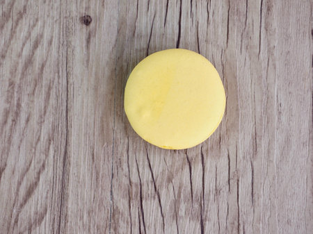 yellow macaroons background, food, snackの写真素材