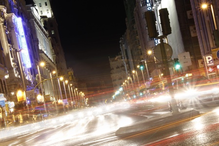 Famous and typical street of Gran Via in Madrid at nightの写真素材