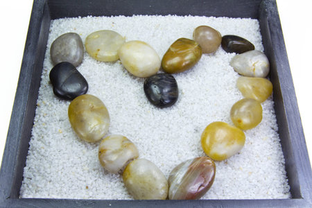 Zen garden with rocks and white sandの写真素材