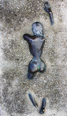 sculpture in bronze and concrete face down naked coupleのeditorial素材