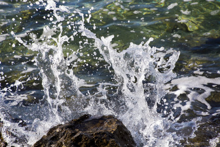 waves crashing on rocks