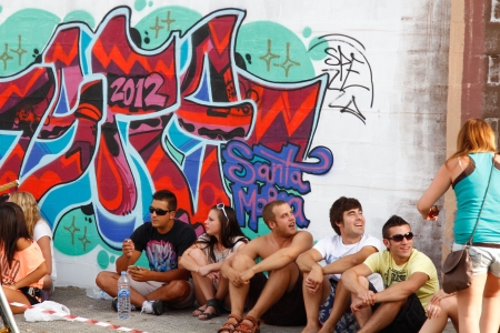 Madrid, SPAIN Sep 18 - pretty girls and boys with summer dresses attending the various activities offered this great festival - Graffiti and Dance first international festival, Aqui huele a pintura ,Spain September 2012のeditorial素材