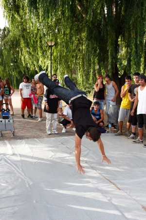 Madrid, SPAIN Sep 18 - participants perform their incredible break dance moves and jumps to the astonished public - Graffiti and Dance first international festival, Aqui huele a pintura ,Spain September 2012のeditorial素材