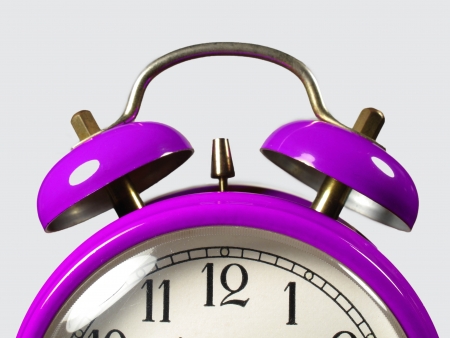 Alarm clock in the foregroundの写真素材