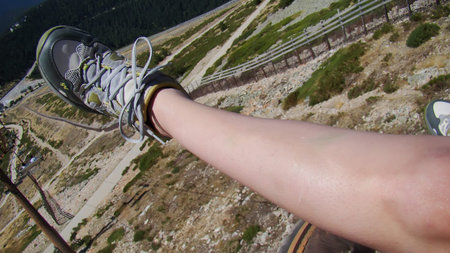 shoe leg in the air