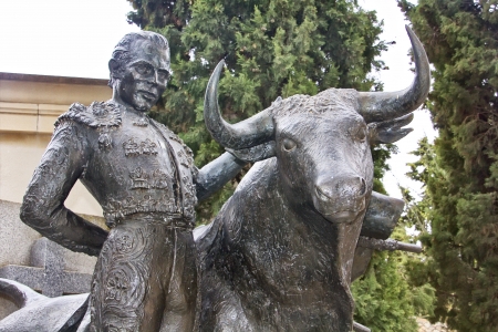bronze sculpture of matador bullfightingの写真素材
