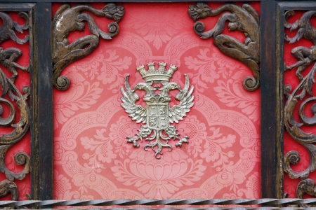 nobility old box with wood and decorated with a red cloth emblemの写真素材