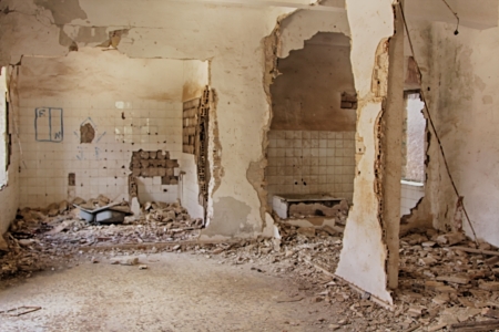 dilapidated housing interior destroyed by bomb explosionの写真素材
