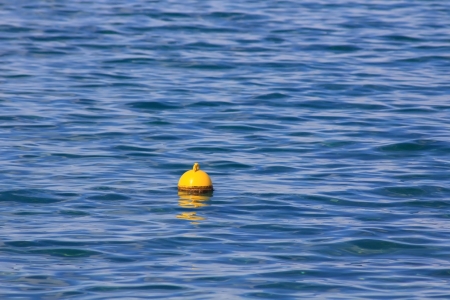 fishing buoy in the blue seaの写真素材