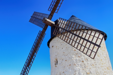 old Windmill XVI century white stone and woodの写真素材