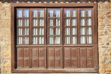 Wood and glass windows in Santillana del Mar Spainの写真素材