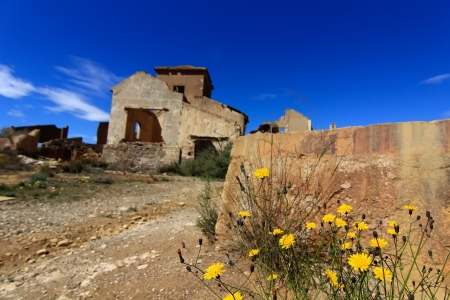 old village destroyed in ruins and abandoned by the bombs of warの写真素材