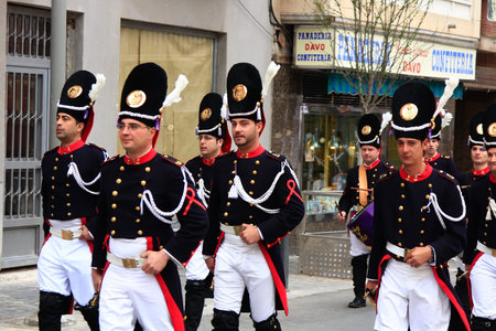CARTAGENA, SPAIN Mar 25: Picket of soldiers parading with evening dress during the Holy week of...