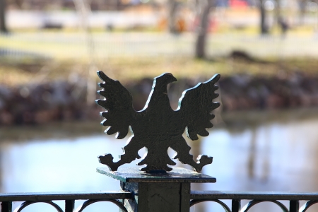 ornamental iron eagle as an old bridgeの写真素材