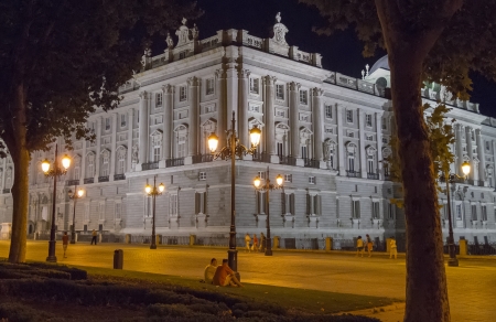Night view of the East Palace in Madrid, Spainの写真素材