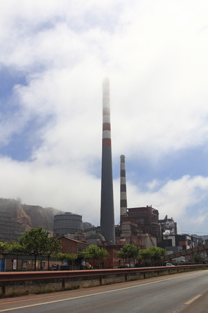 large chimneys in a factoryの写真素材