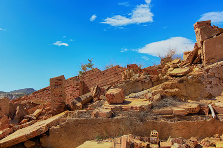old village destroyed in ruins and abandoned by the bombs of warの写真素材
