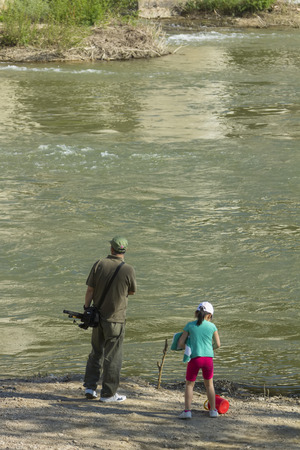 TOLEDO,SPAIN - APRIL 20:day of family fishing in the river Tajo April 20, 2014 in Toledo Spainのeditorial素材