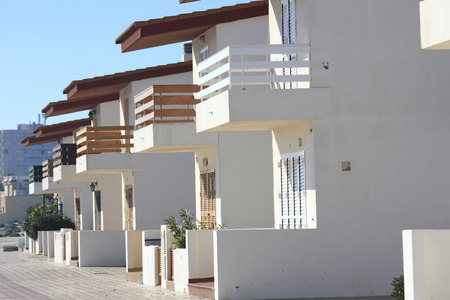 row of small white color apartmentsのeditorial素材