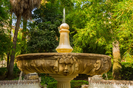 beautiful ornamental fountain highly decorated in the Park of Malaga, Spainの写真素材