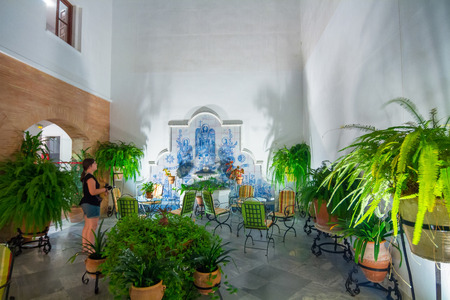 typical Andalusian courtyard decorated with flowers in the city of Cordoba, Spainのeditorial素材