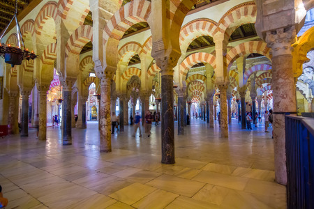 CORDOBA, SPAIN September 5, 2014: 
arches and columns of red and white color of the famous mosque 
September, 5, 2014 in Cordoba, Spainのeditorial素材
