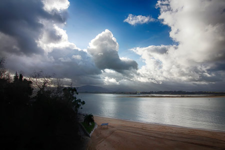beautiful landscape with sea coast and big cloudsの写真素材