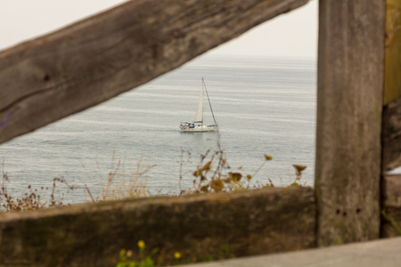 Old wooden railing seasideの写真素材