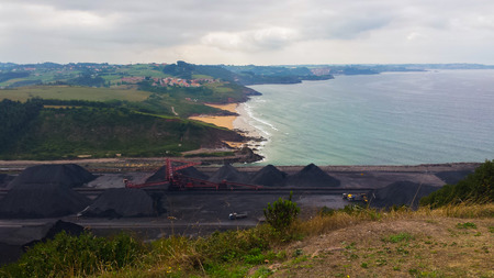 Coal storage area by the seaの写真素材