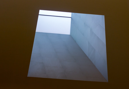 Bright squares on a white roof skylightsの写真素材