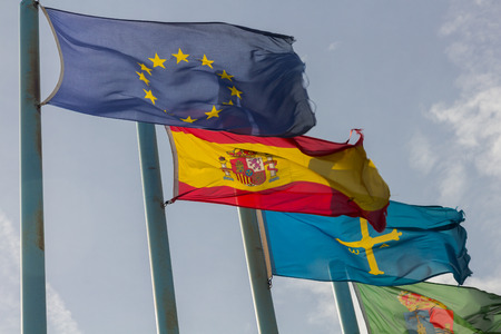 Regional flags of Spain in the windの写真素材