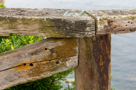 Old wooden railing seaside