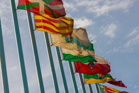 Regional flags of Spain in the windの写真素材