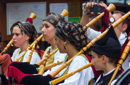 OVIEDO, Spain August 25, 2015: Group of bagpipers to parade through the streets to attract tourism in Oviedo, Spainのeditorial素材