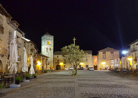 Ainsa 10 September 2017: Plaza Mayor at night of the tourist town of Ainsa, Spainのeditorial素材