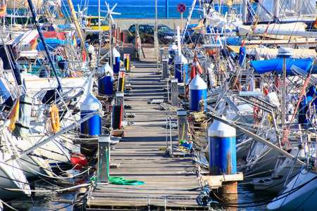 Alicante, Spain 06/15/2019: a wooden jetty for sailboats