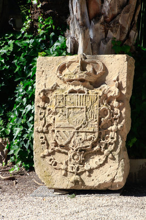 Elche, Spain; 03/10/2019: ancient coat of arms carved in stoneのeditorial素材