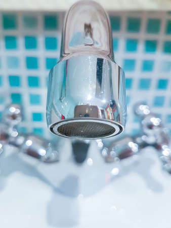 tap detail of a sink in perspectiveの写真素材