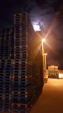 Madrid, Spain 08/16/2019: outdoor areas of a factory at nightの写真素材