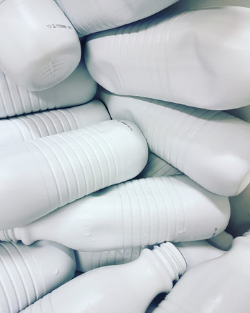 background with lots of white plastic bottles