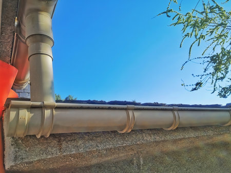 a rain gutter on a buildingの写真素材