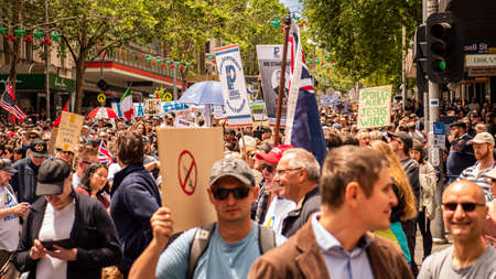 Melbourne, Victoria Australia - November 20 2021: Thousands of people fill the streets holding political signs on Bourke Street Freedom March and Kill the Bill Peaceful Protestsのeditorial素材