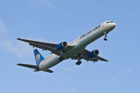 London Gatwick Airport, England, UK - June 13, 2009: A Thomas Cook Boeing 757-200 short finals runway 26L at London Gatwick Airportのeditorial素材