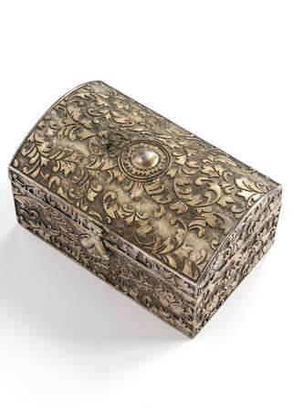 A decorative trinket box on a white background with shadowの写真素材